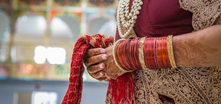 Hands holding scarf, Kanyadaan ritual.